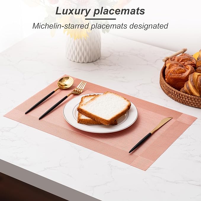 CADONO Placemats Set of 4 Washable Indoor/Outdoor Vinyl Place Mats for Dining Table Durable Non-Slip Heat Resistant PVC Weave Table Mats(Four-Corner-Peachpink)