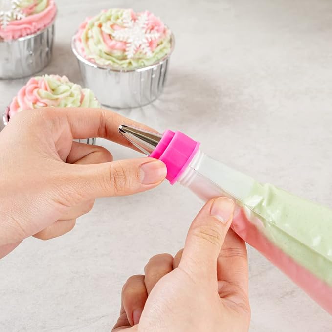 Restaurantware COUPLER ONLY: Pastry Tek 1.1 x 2.4 Inch Swirl Coupler 1 Durable Tip Coupler - Dual Tone Piping Bag Sold Separately Pink & White Plastic Icing Tip Coupler For 0.7 to 1 Inch Tips
