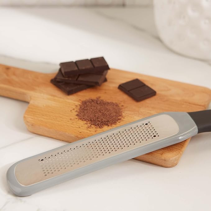 RSVP International Paddle Grater, Etched Steel Blades, Stainless Steel Hand Held Kitchen Cheese & Vegetable Shredder Comfort Grip Handle and Anti-Slip Foot and Safety Cover, Fine Zester