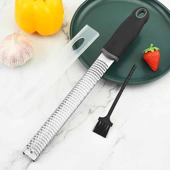 1Pack Lemon Zester Stainless Steel Cheese Grater with Plastic Cover Ergonomic Soft Black Handle Handheld Rotary Cheese Grater Zester Ideal for Kitchen Use and Food Preparation