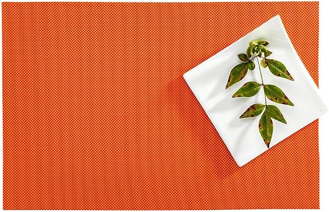 Restaurantware Carmel Mesh 16 x 12 Inch Table Placemats Set Of 6 Woven Washable Placemats - Heat Tolerant No Stain Tangerine Vinyl Kitchen Placemats Waterproof Easy To Clean
