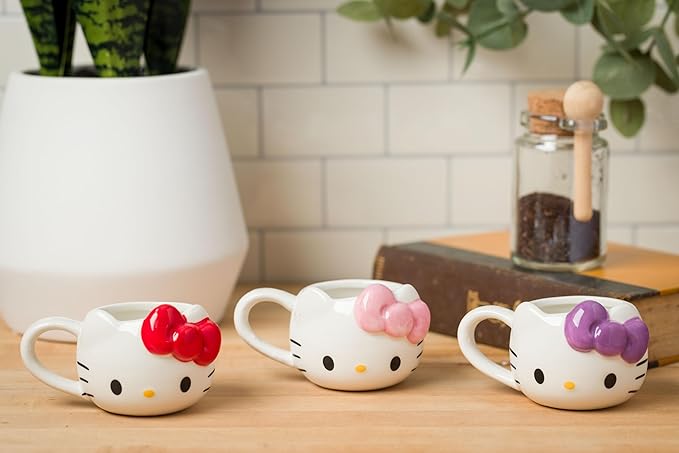 Silver Buffalo Sanrio Hello Kitty Different Color Bows 3 Pack Ceramic 3D Sculpted Mini Cup Set with Handles, Perfect as a Sugar, Cream, or Milk Set, 3.5 Ounces