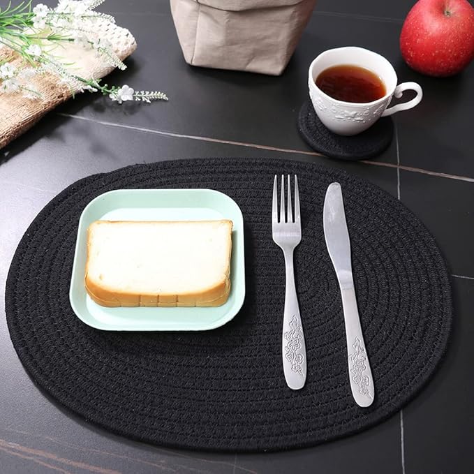 Oval Woven Placemats Set of 4, Rattan Placemats 12x16 Inch Cotton Wicker Placemats Farmhouse Boho Circle Braided Heat Resistant Outdoor Placemats Patio Table Place Mats (Black)