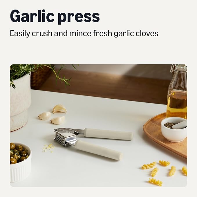 Amazon Basics Garlic Press, Stainless Steel, Soft Grip Handle, Dishwasher-Safe, Linen Gray
