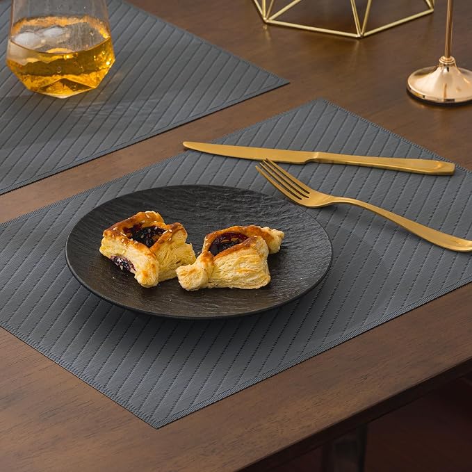 BACKTOEDEN Placemats Set of 8 Heat Resistant Washable Wipeable Placemat Woven Non-Slip Foldable Vinyl/Plastic Place Mats Indoor/Outdoor Mat Kitchen Dining Table Pad, Dark Gray Twill