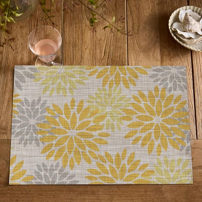 Artoid Mode Floral Plastic Placemats Set of 4, 12x18 Inch Washable Non-Slip Plastic Vinyl Place Mats for Party Kitchen Dining Decor, Yellow